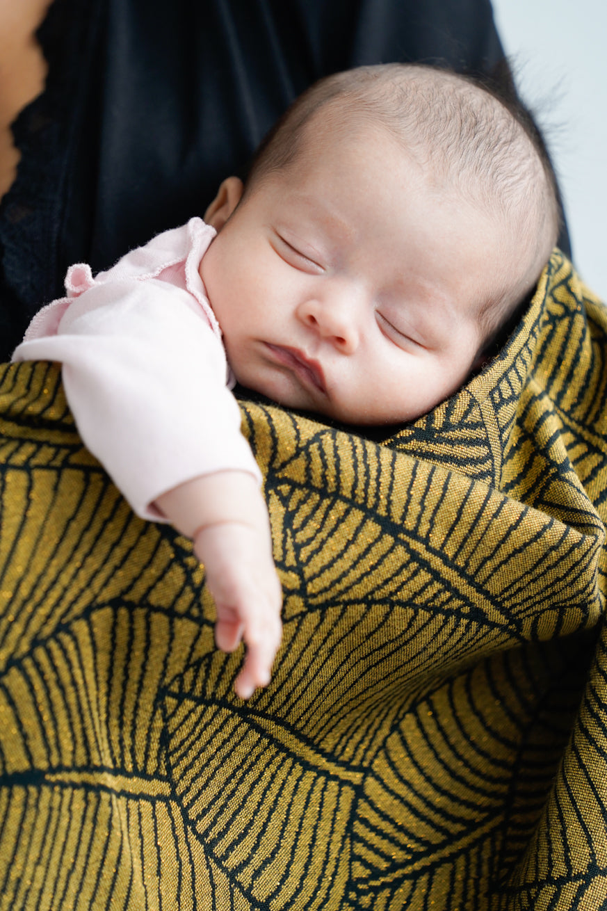 Knuffelende doek/sjaalbladeren lynne